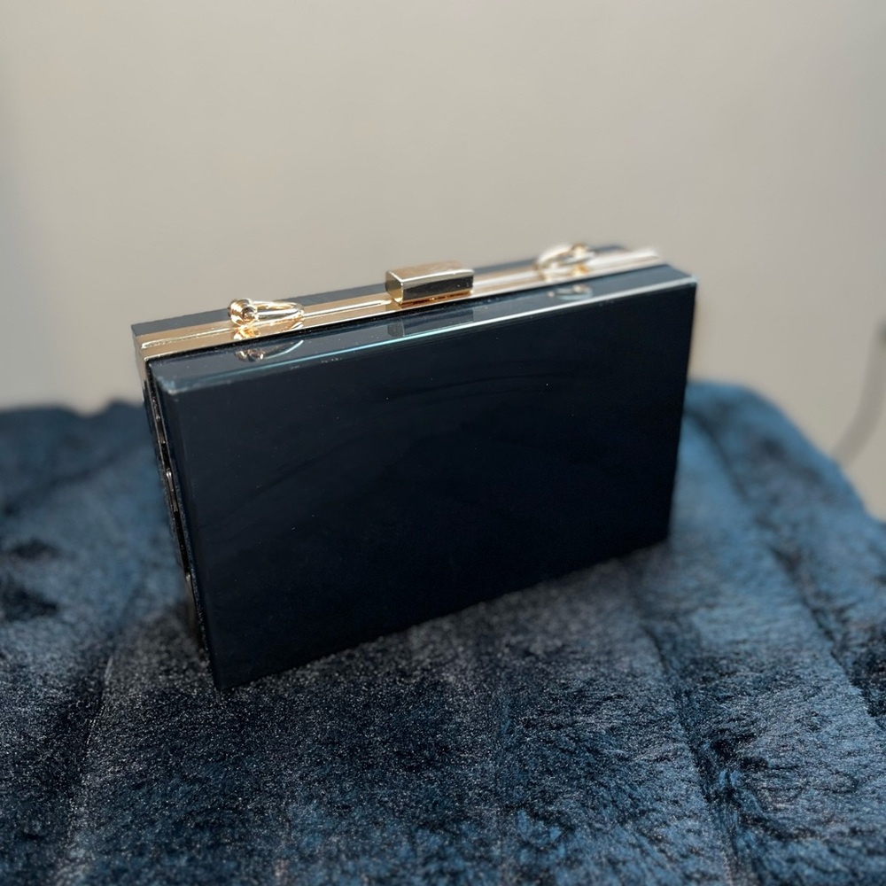 Elegant Black Clutch with Gold Accents